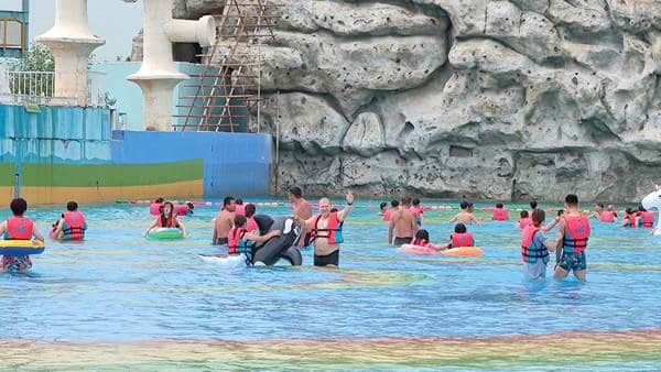 Dad is swimming at Qiqihar waterpark, road trip China